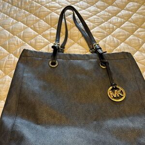Michael Kors black leather tote .